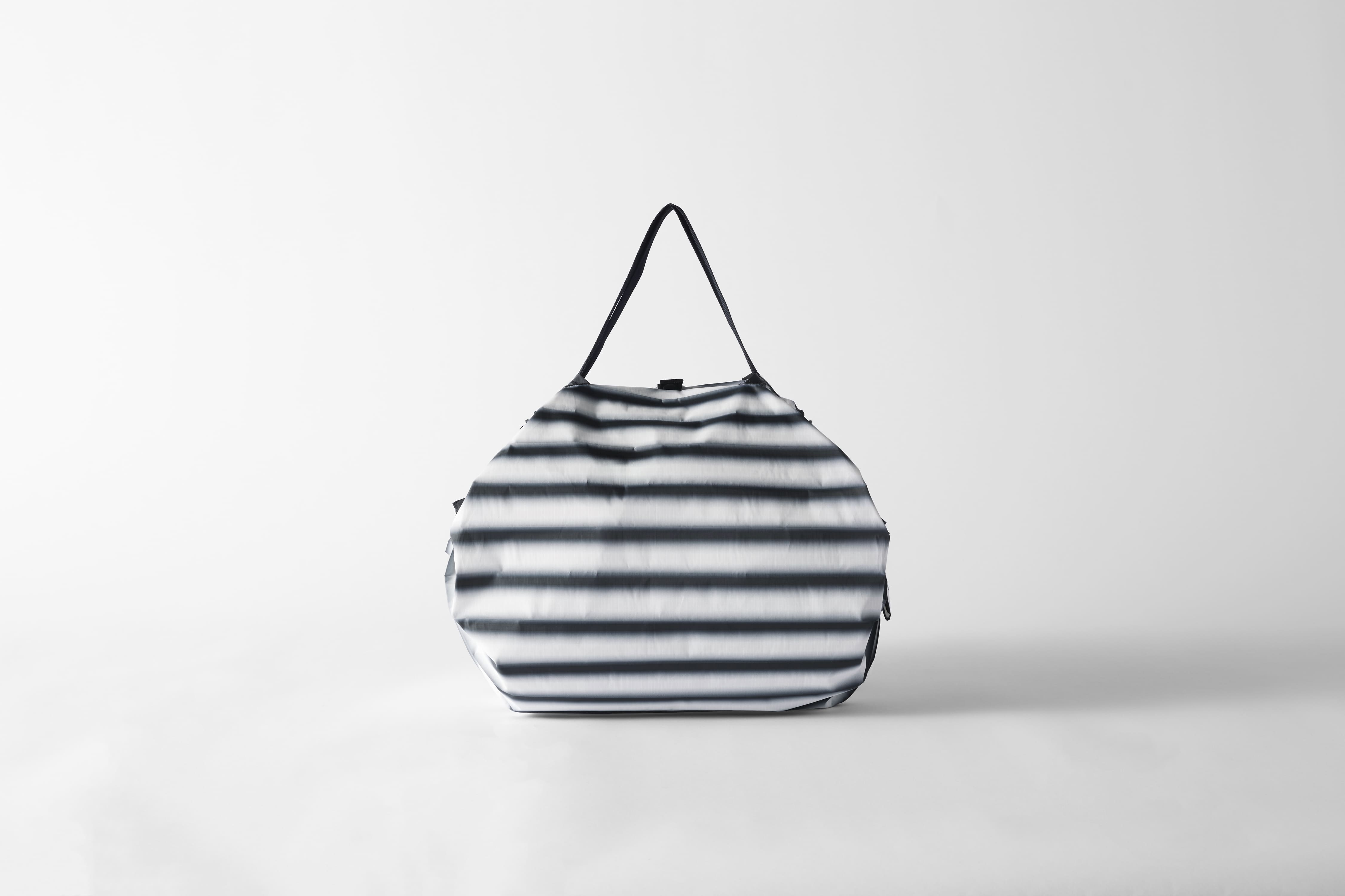 Compact Bag M, "10th Anniversary" Highlight schwarz - Faltbare Tasche One-Pull (patentiert)