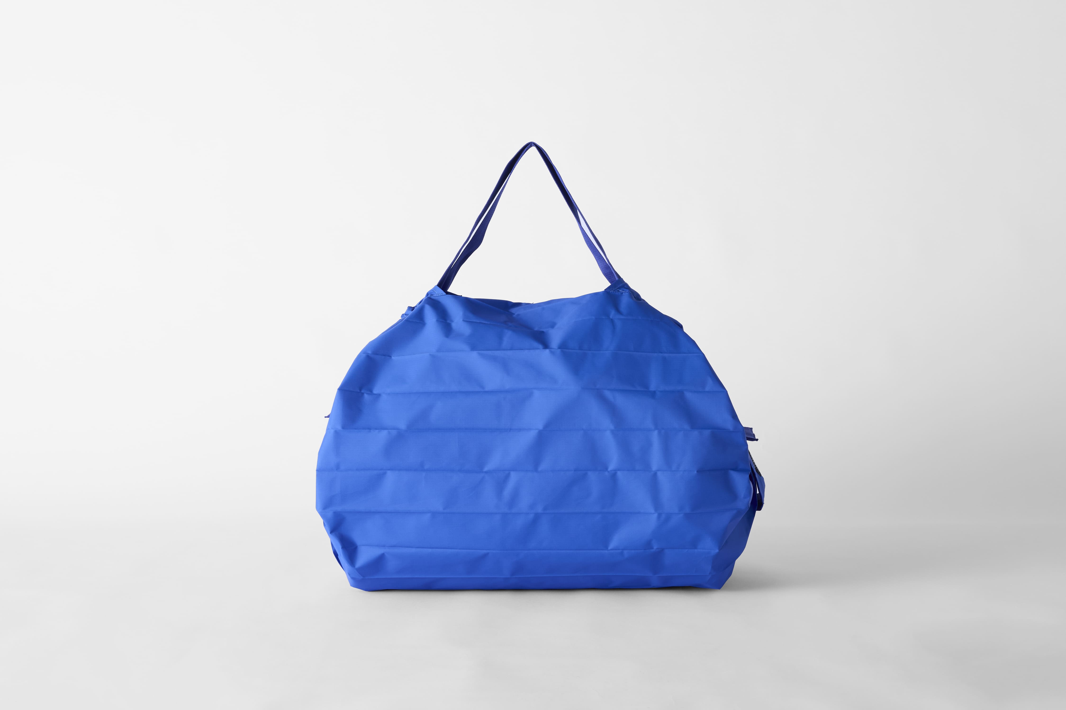 Compact Bag L - Clear Sky - Faltbare Einkaufstasche One-Pull (patentiert)