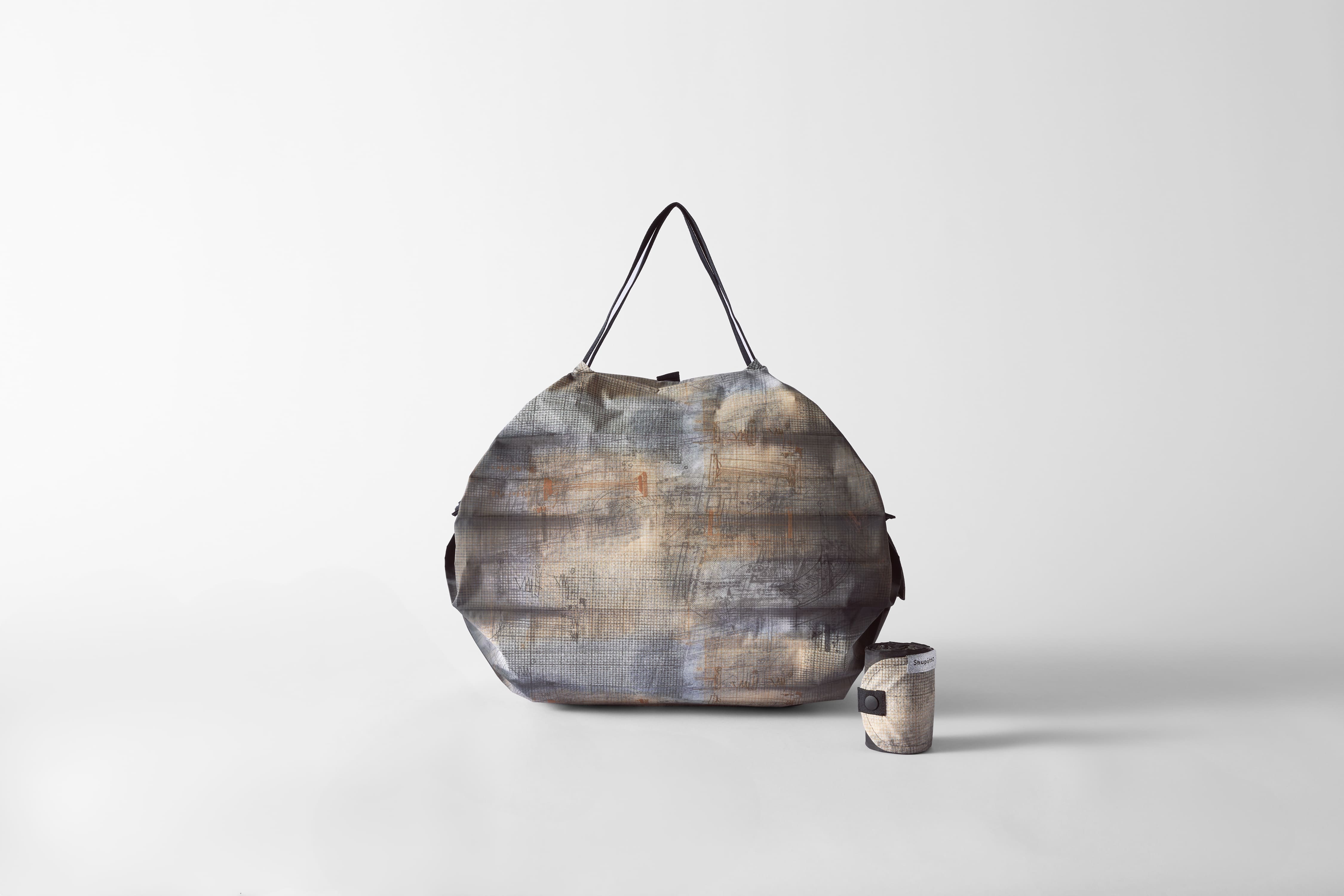 Compact Bag M, "10th Anniversary" Inception grau - Faltbare Tasche One-Pull (patentiert)